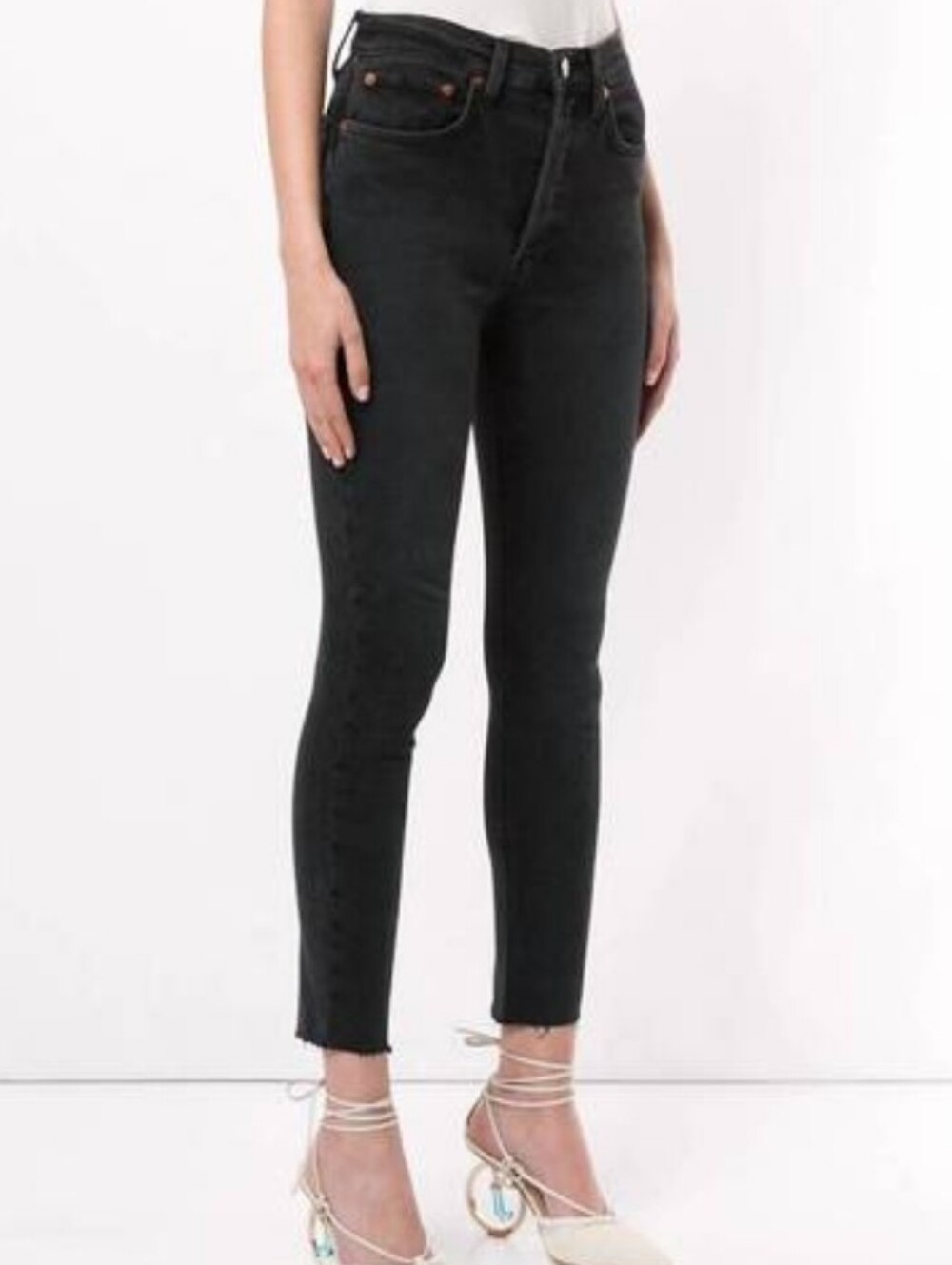 Re/Done High-Rise Distressed Knee Skinny Jeans in Black